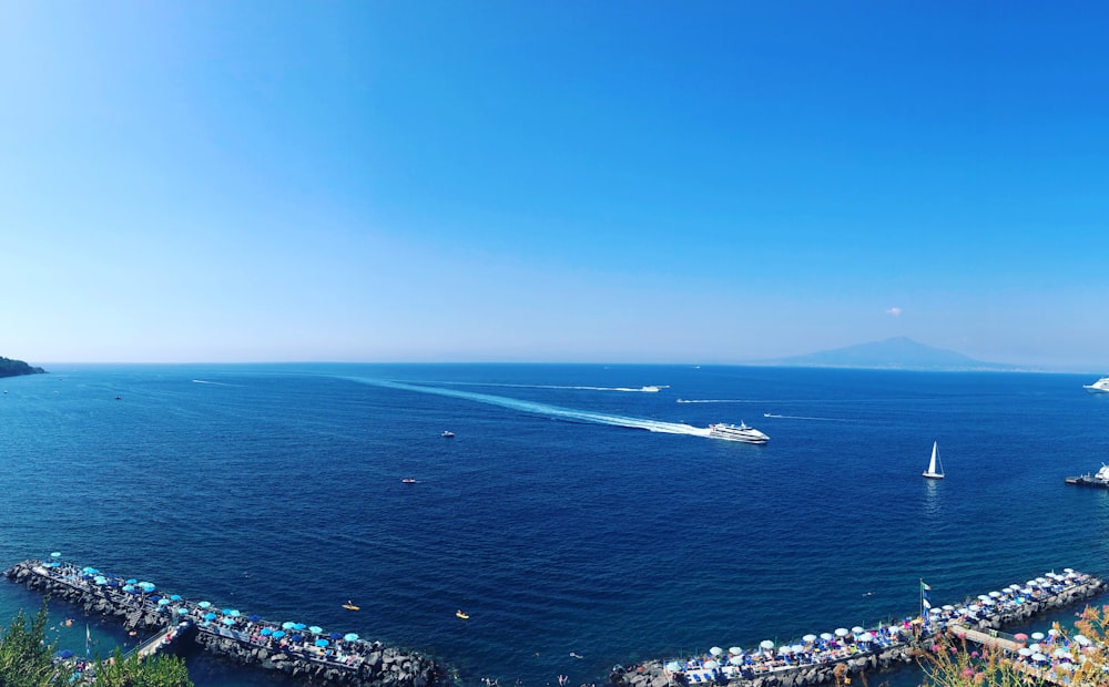 aerial view of city buildings near sea during daytime