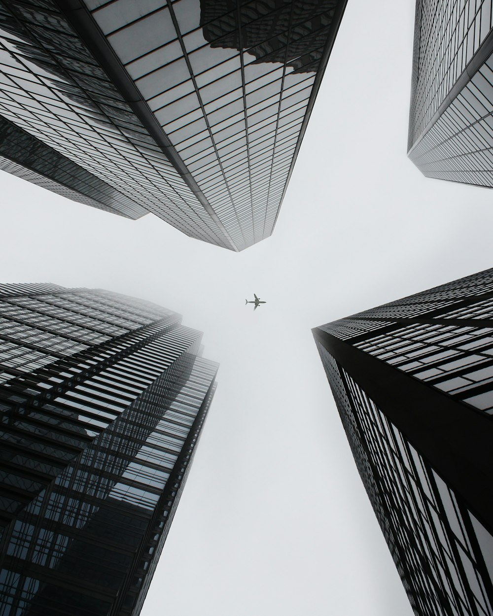 low angle photography of high rise buildings