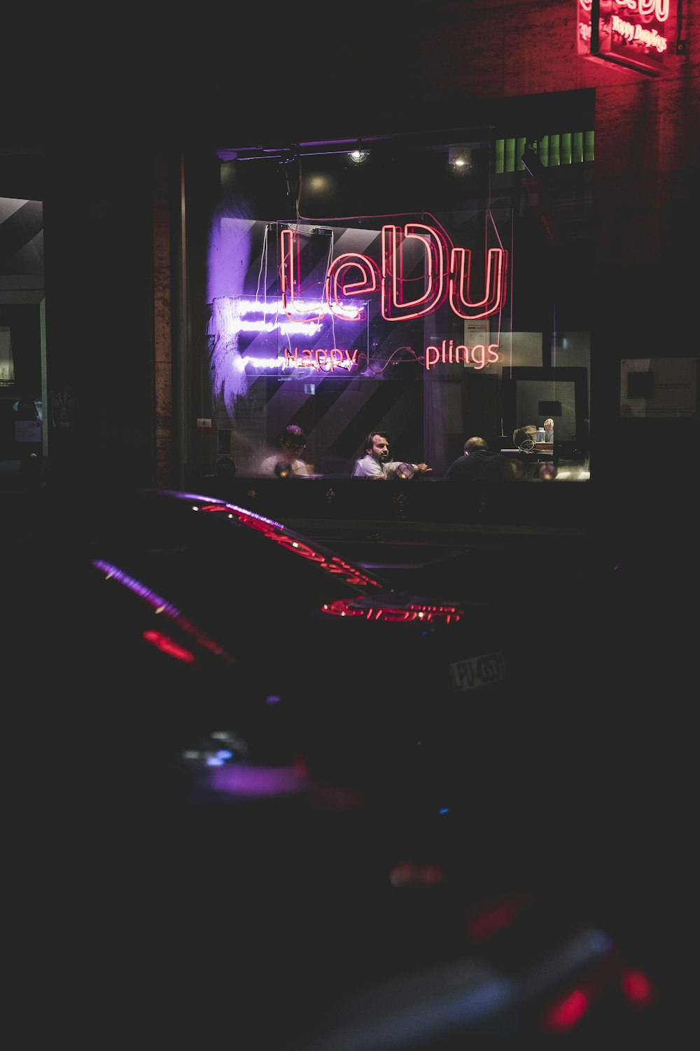 purple and red open neon signage