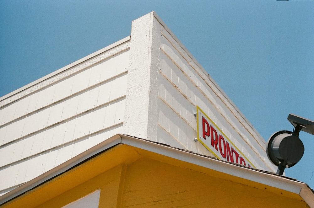 white concrete building under blue sky during daytime