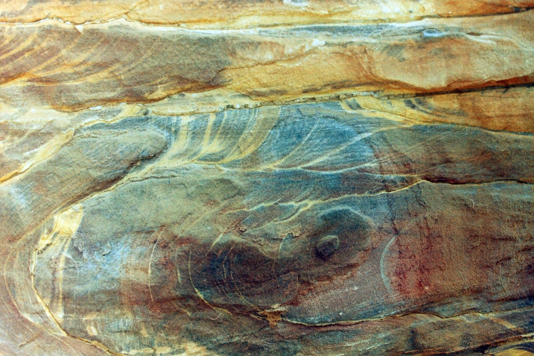 brown and white abstract painting, We were lucky to see Petra dry and wet. When the rocks are wet they shine with specta