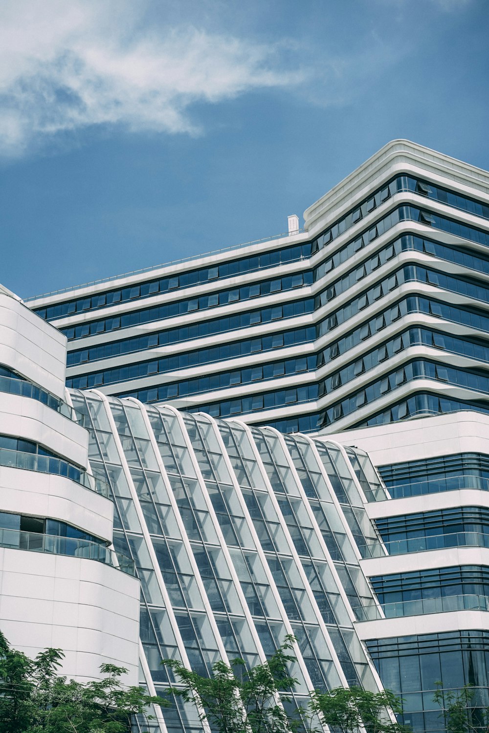 white concrete building under blue sky during daytime