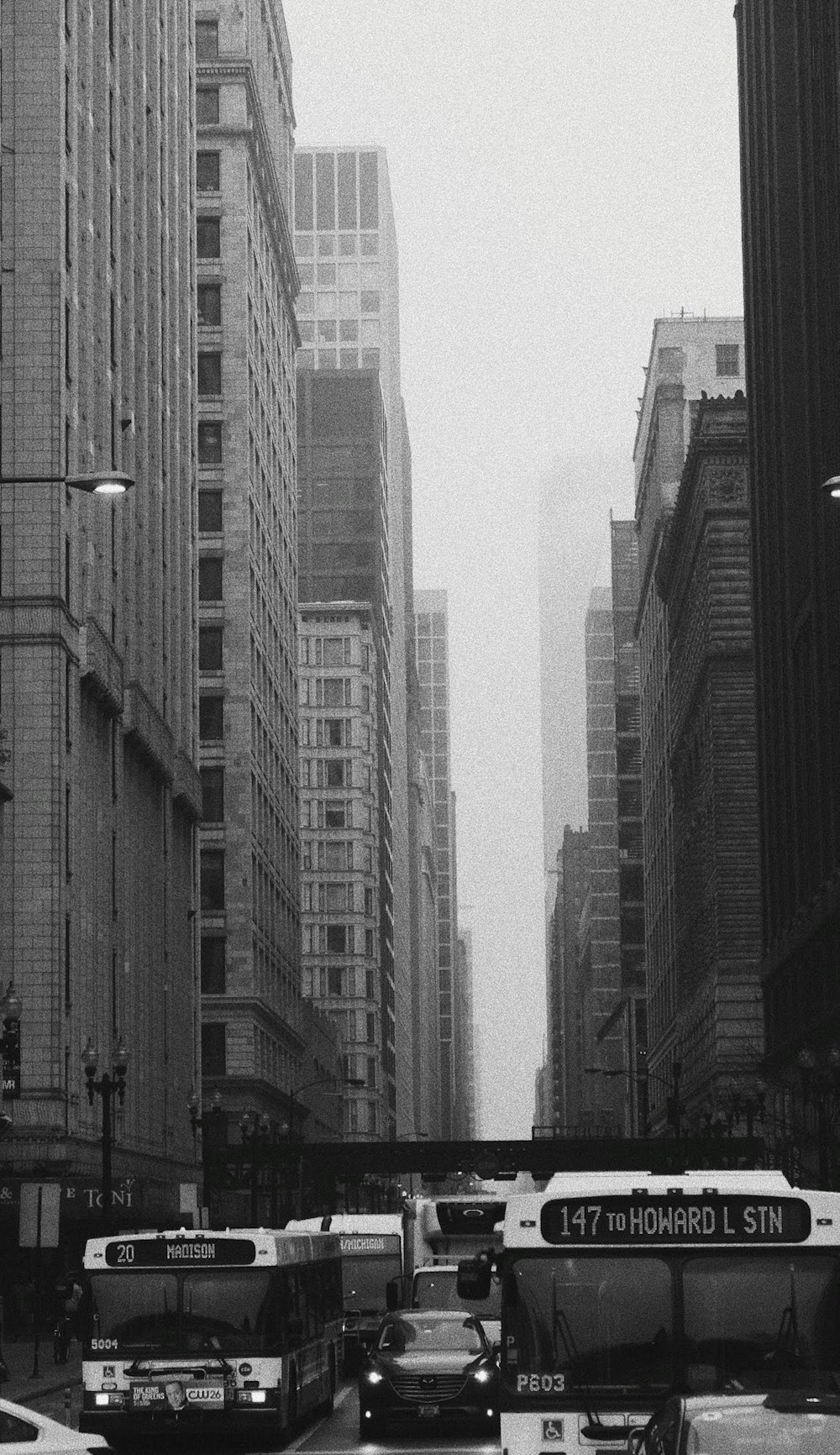 grayscale photo of city buildings