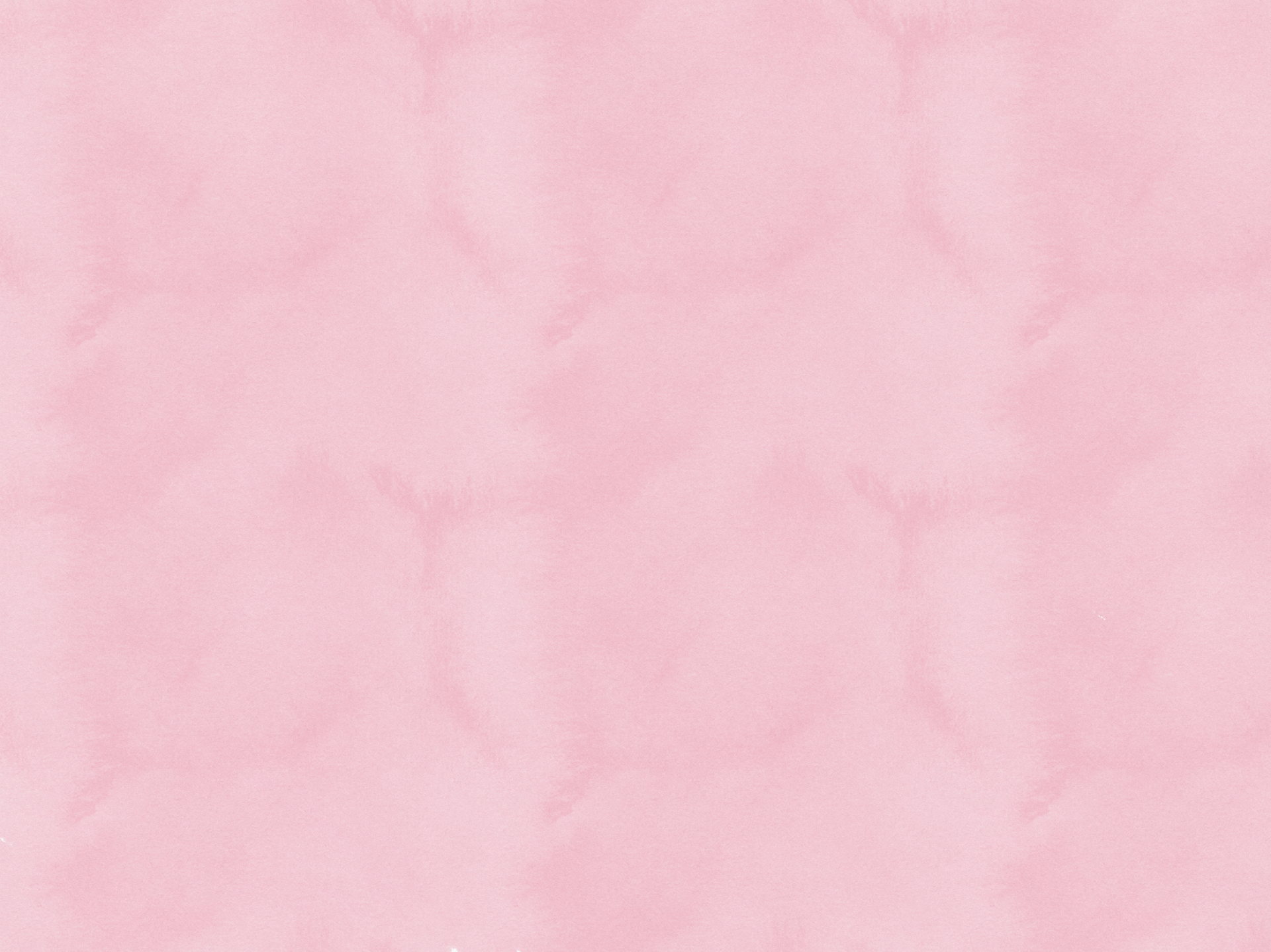 pink textile on brown wooden table
