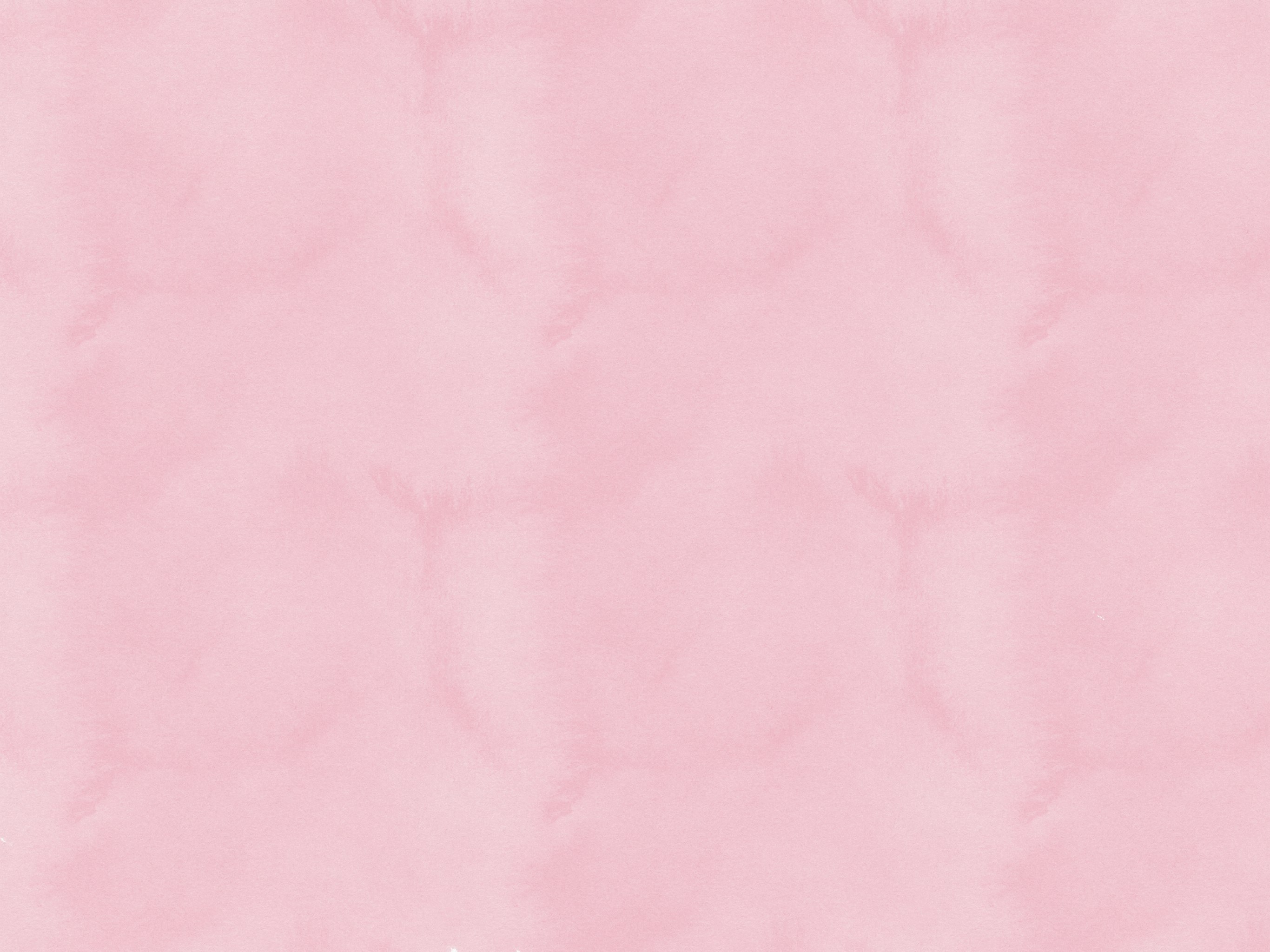 pink textile on brown wooden table