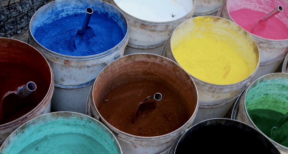 white and blue plastic bucket