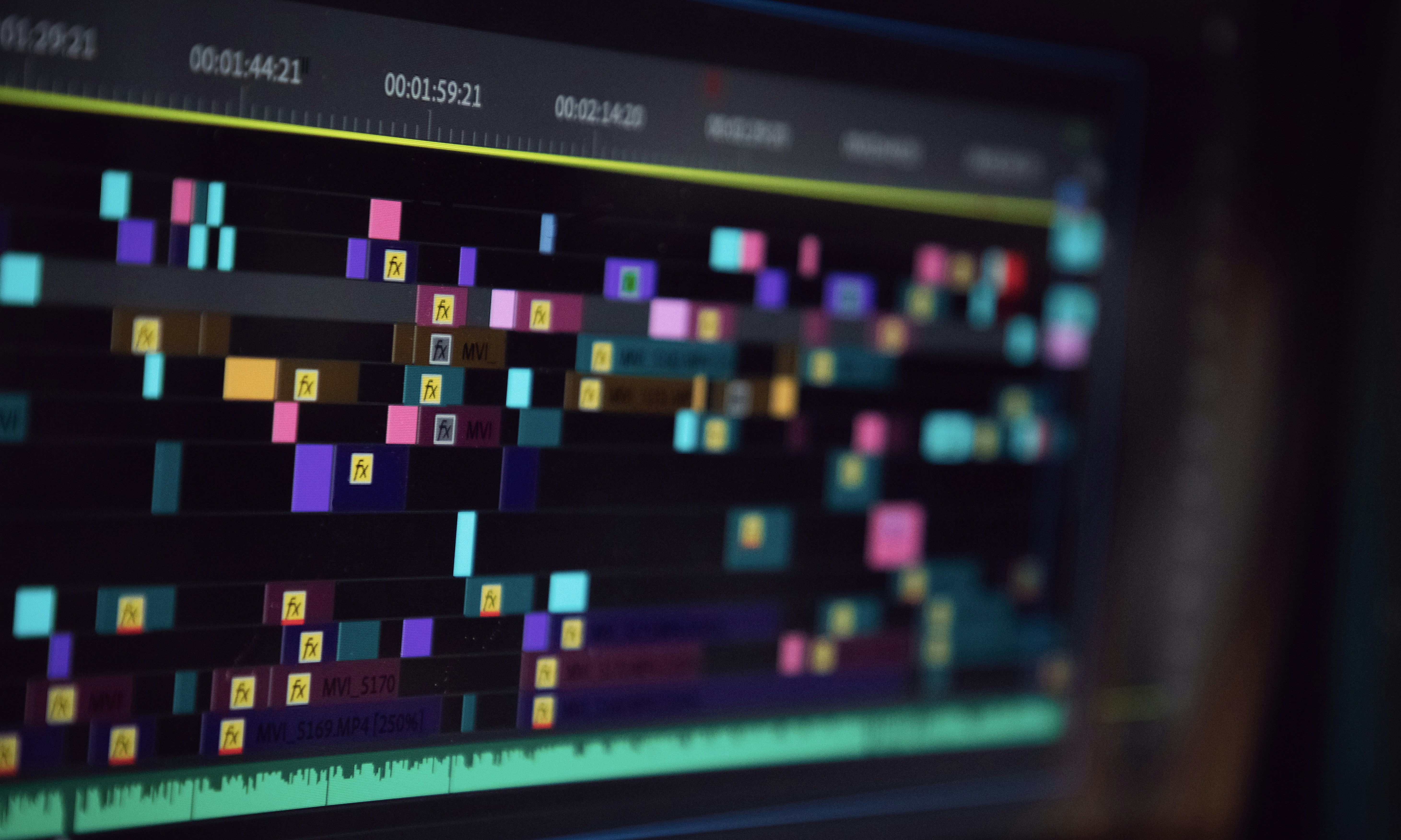digital audio workstation timeline waveforms mixing console