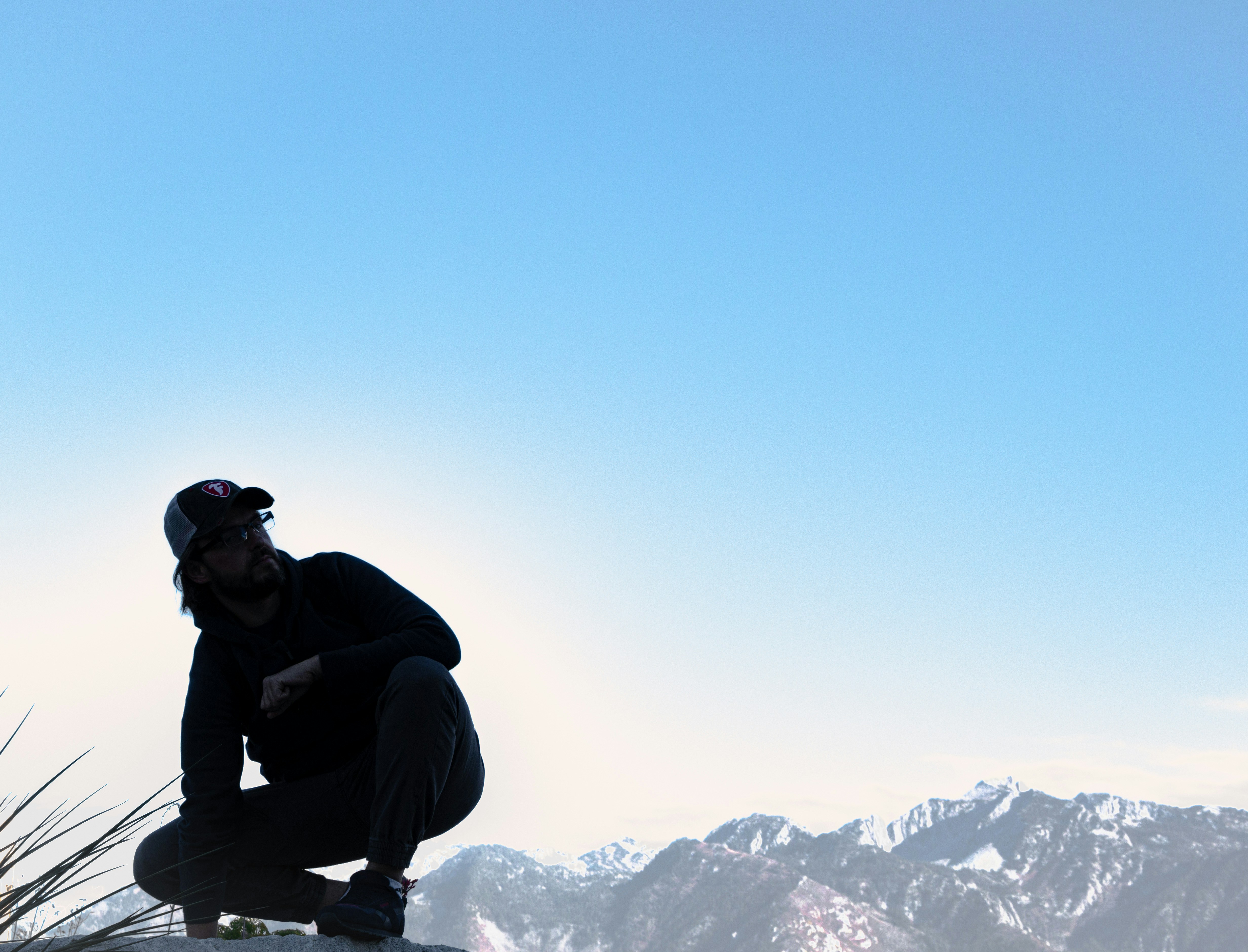 Man silhouette with mountains background