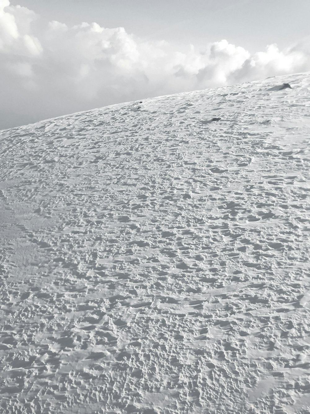 white snow covered mountain under white clouds during daytime