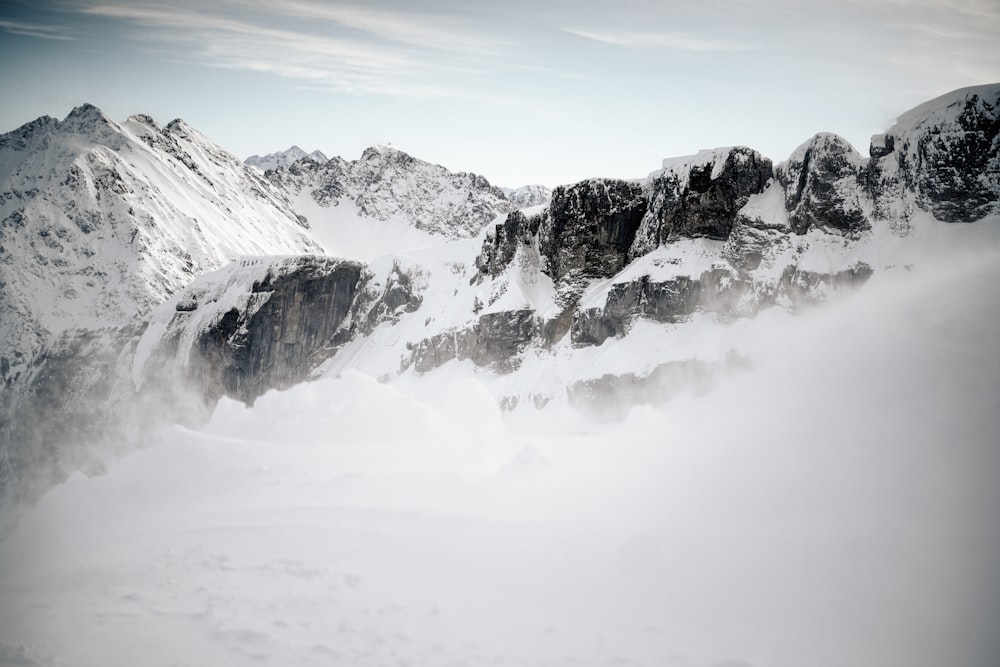 snow covered mountain during daytime