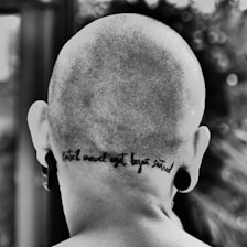 grayscale photo of mans face