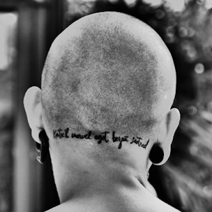 grayscale photo of mans face