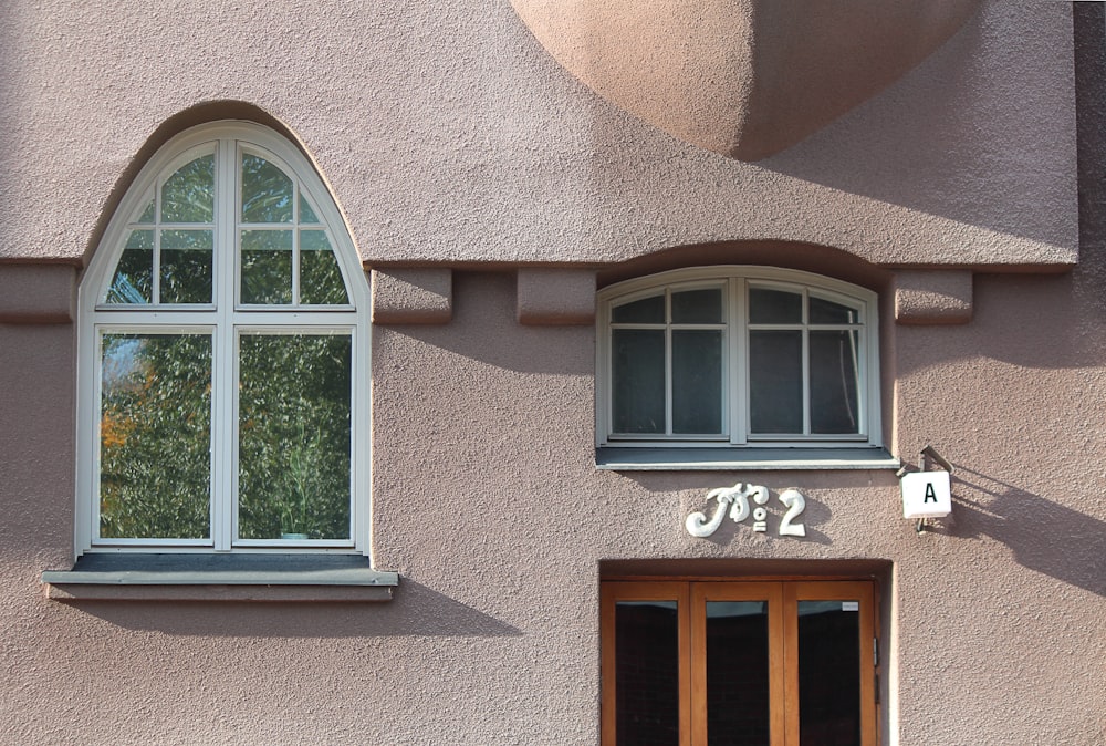 white wooden framed glass window