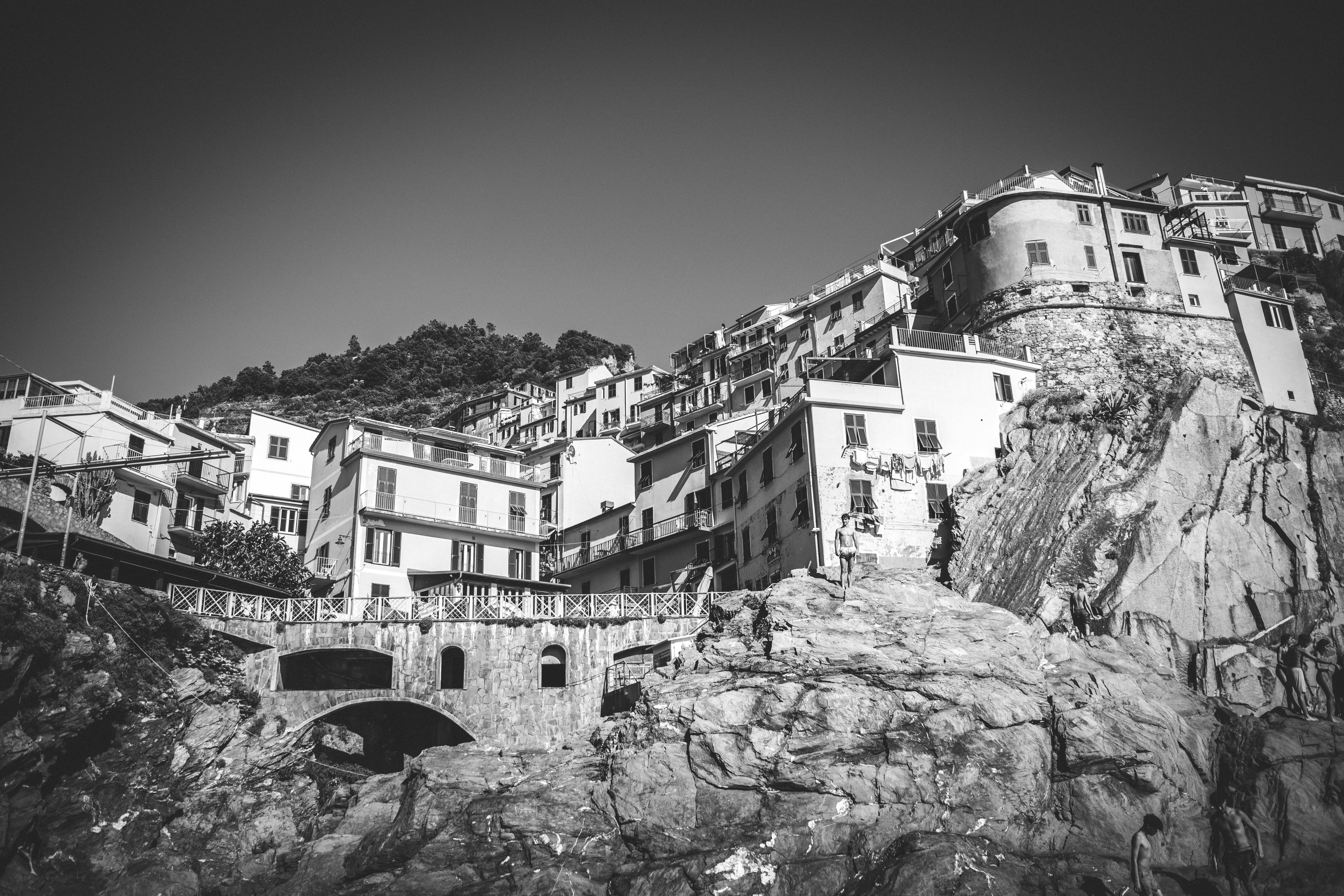 grayscale photo of concrete buildings