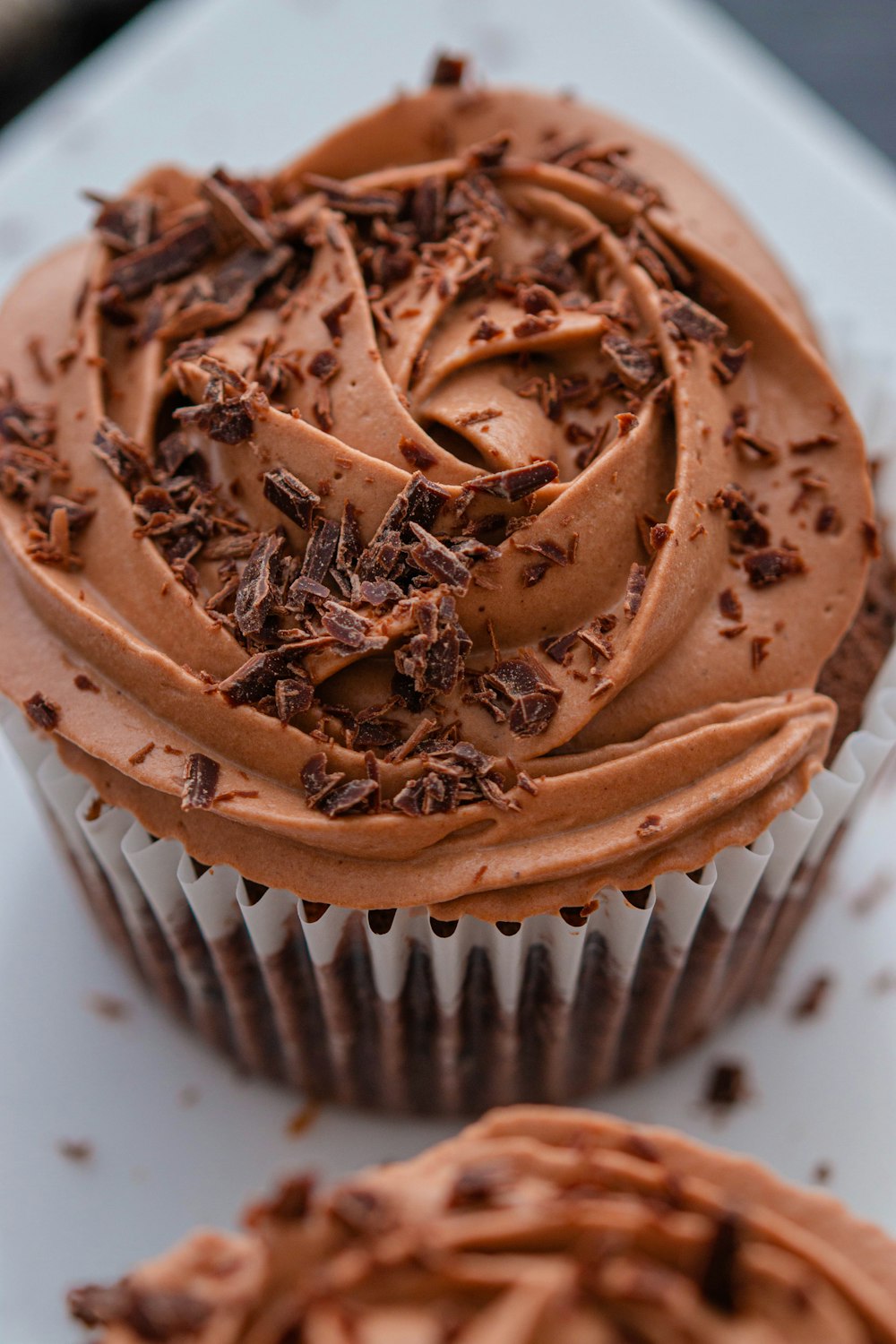 brown cupcake with chocolate on top