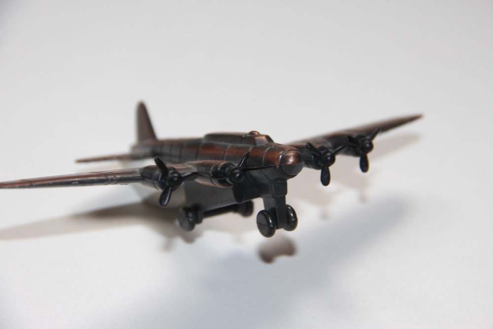 black and gray drone on white surface