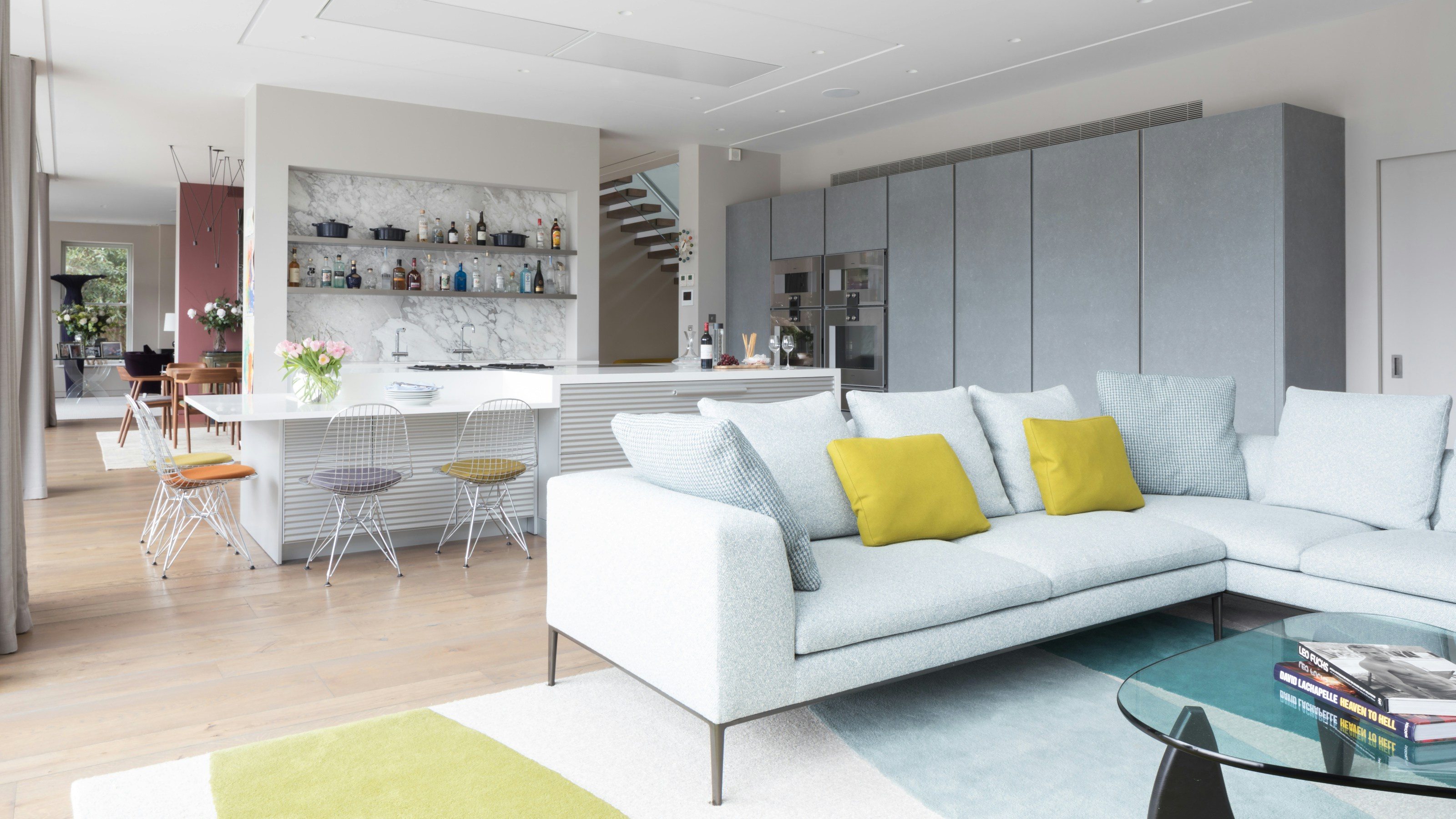 white couch with throw pillows photo Free Indoors Image on Unsplash