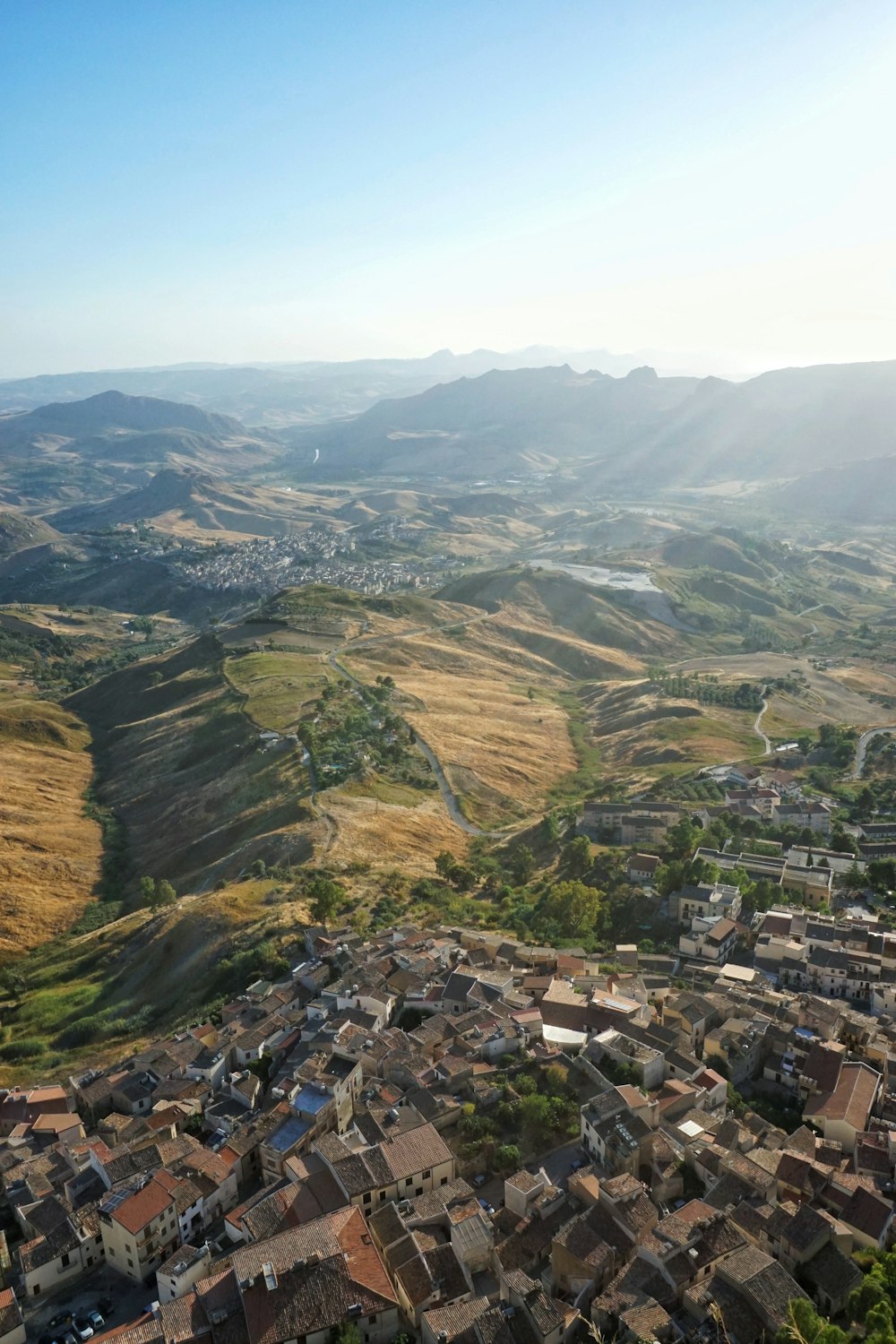 aerial view of green and brown mountains during daytime