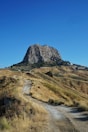 gray rocky mountain under blue sky during daytime