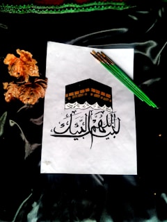 orange flower on white paper