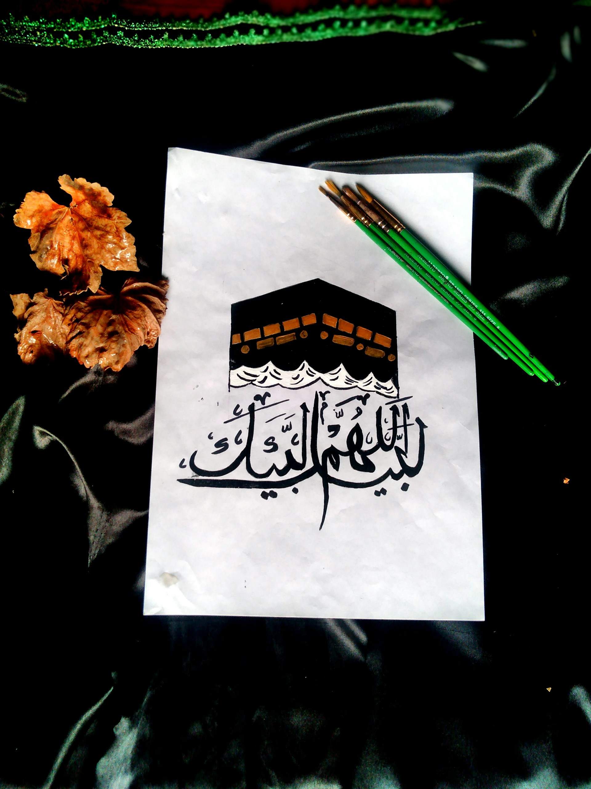 orange flower on white paper