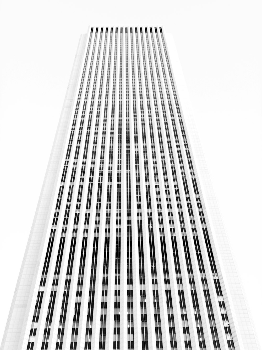 grayscale photo of high rise building