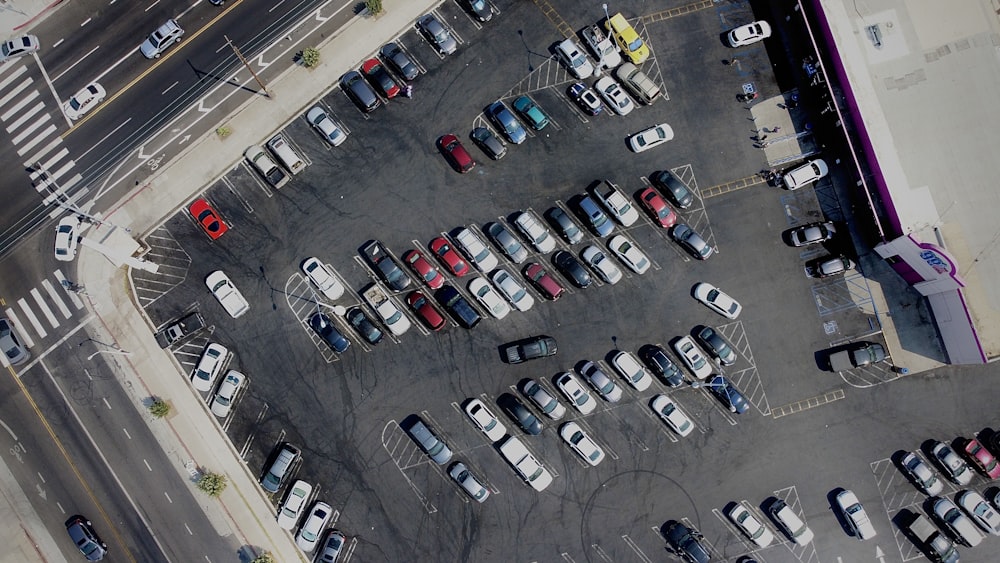 cars parked on parking lot during daytime