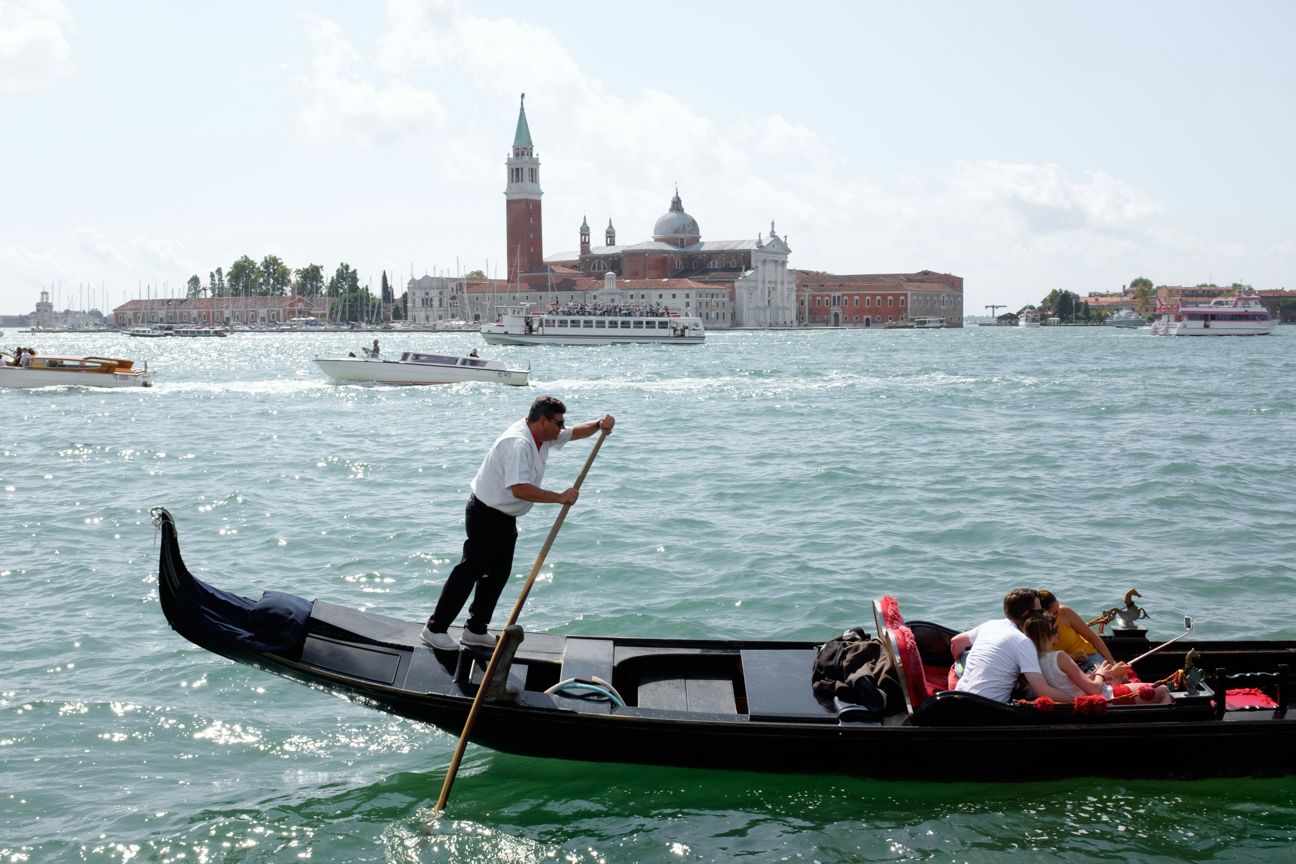 people riding on boat on river during daytime, 