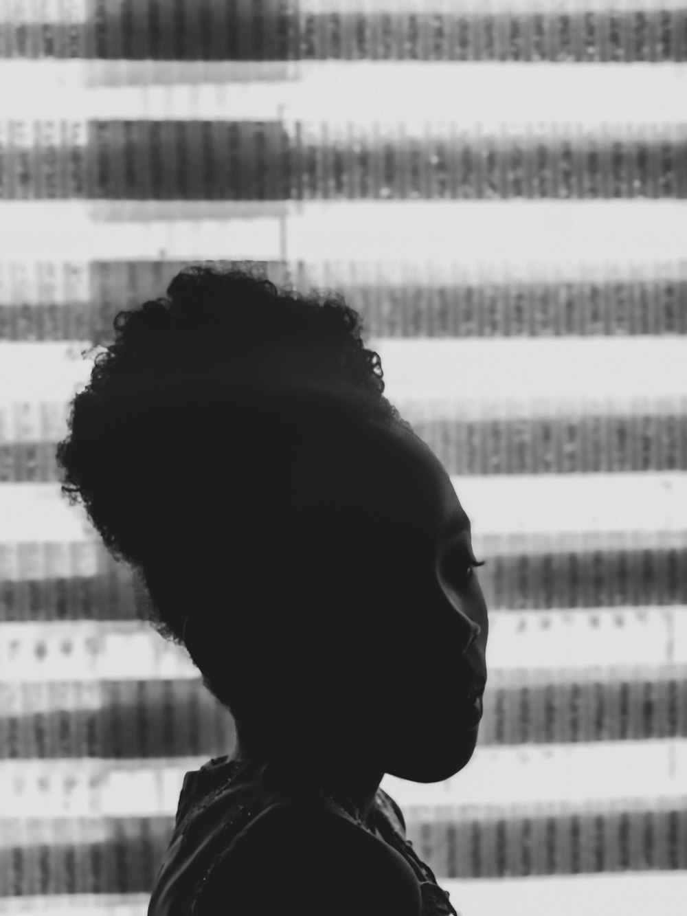 grayscale photo of woman in black shirt