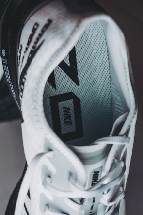 Close-up of trainers showcasing breathable mesh material.