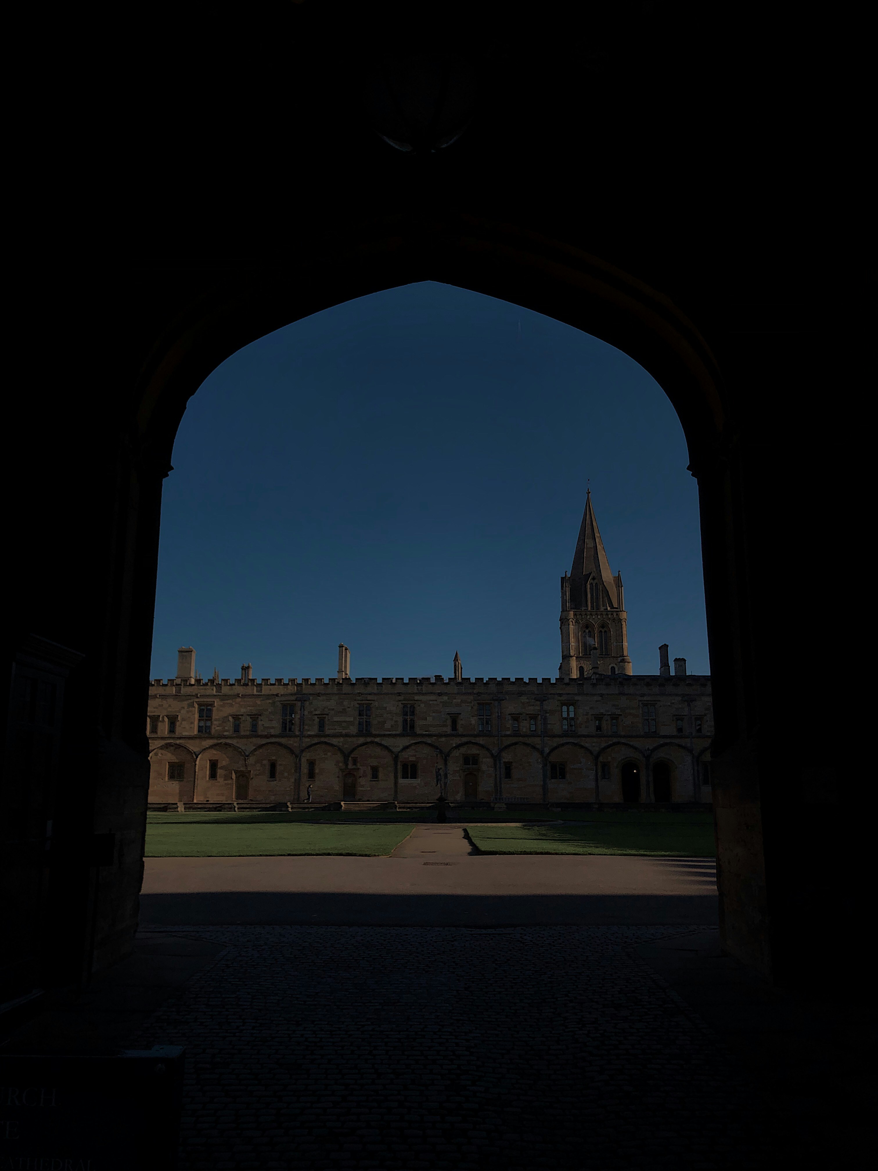 brown concrete building under blue sky during daytime
