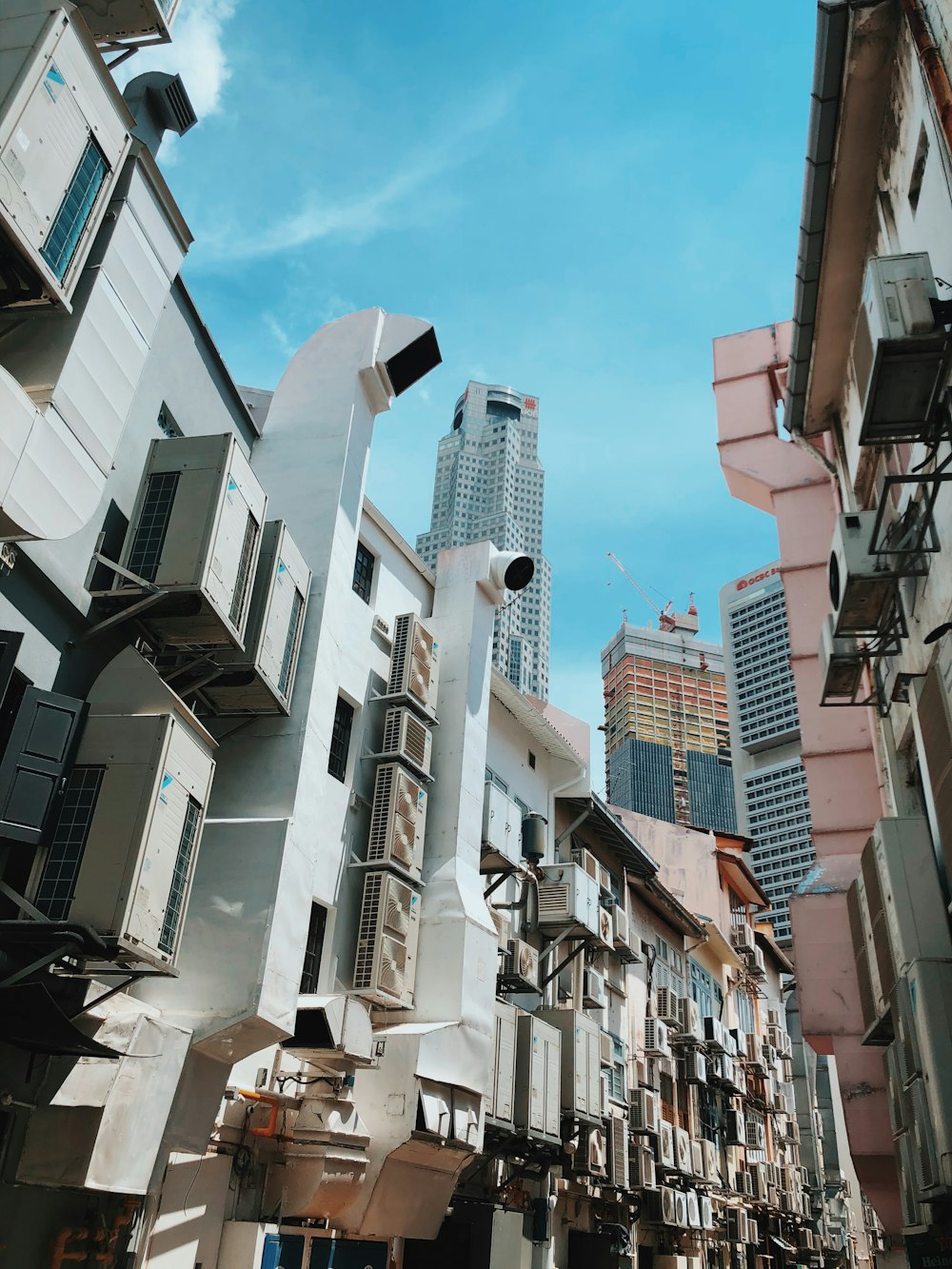 white concrete building under blue sky during daytime