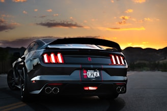 black bmw m 3 on road during sunset
