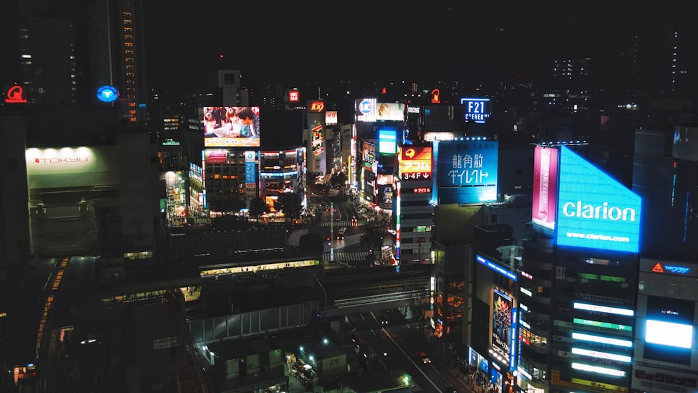 city with high rise buildings during night time