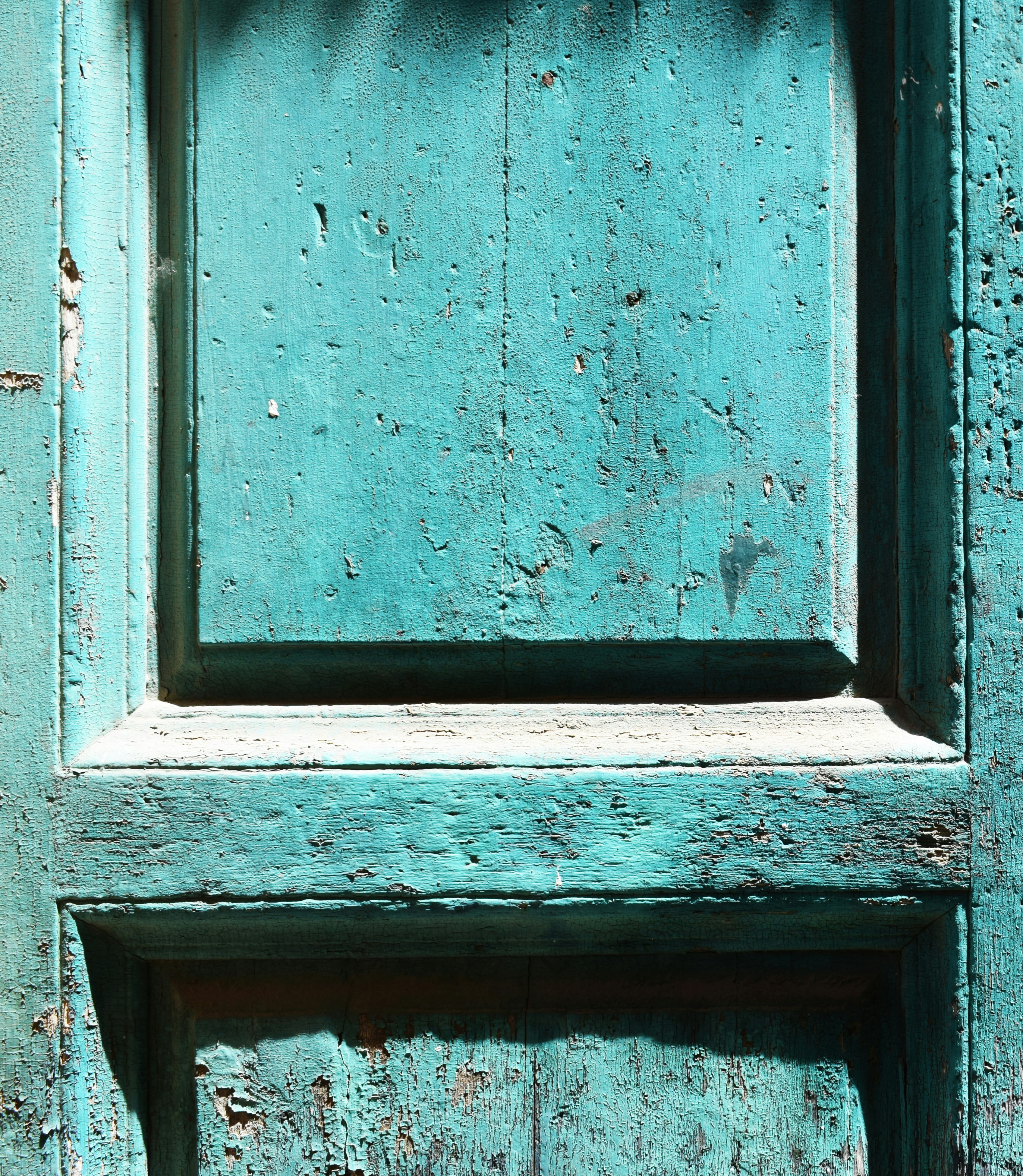 blue wooden window frame during daytime