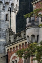 A close-up of architectural details on an old castle building.