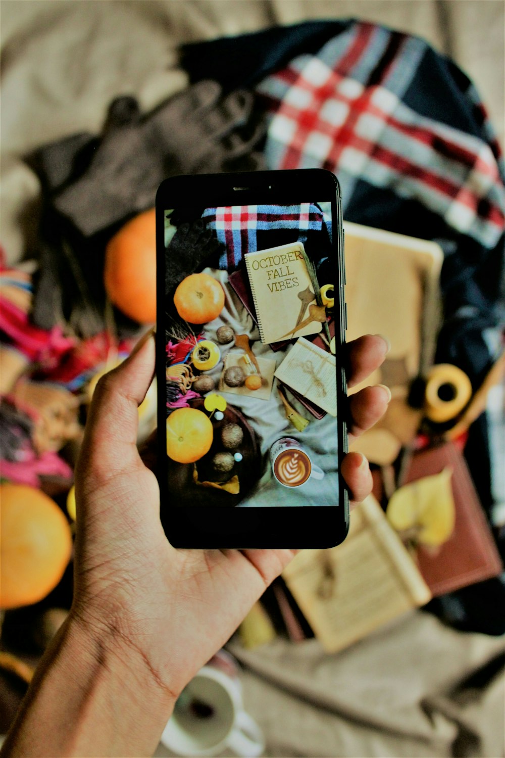 person holding black iphone 4