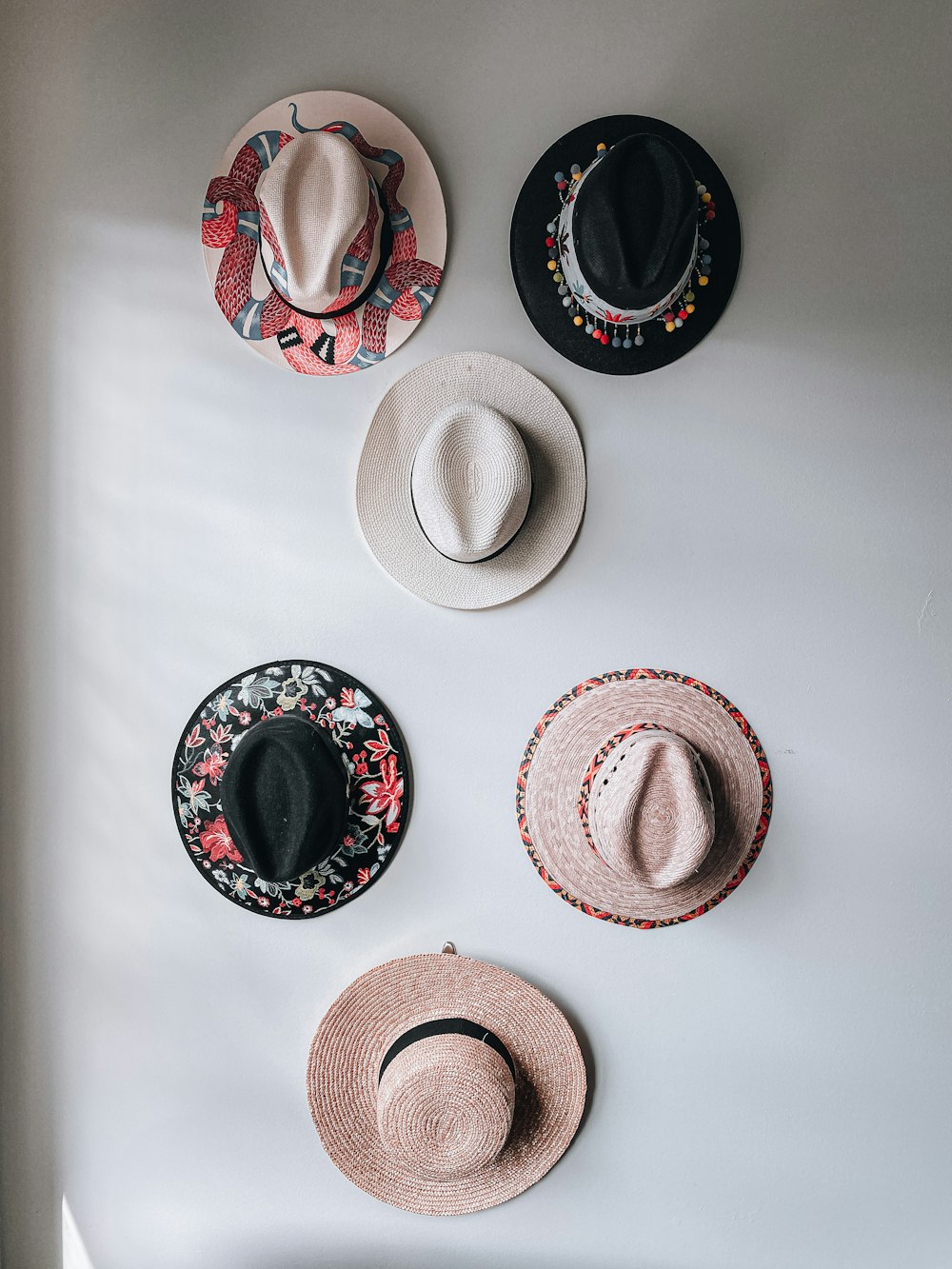 brown and white fedora hats