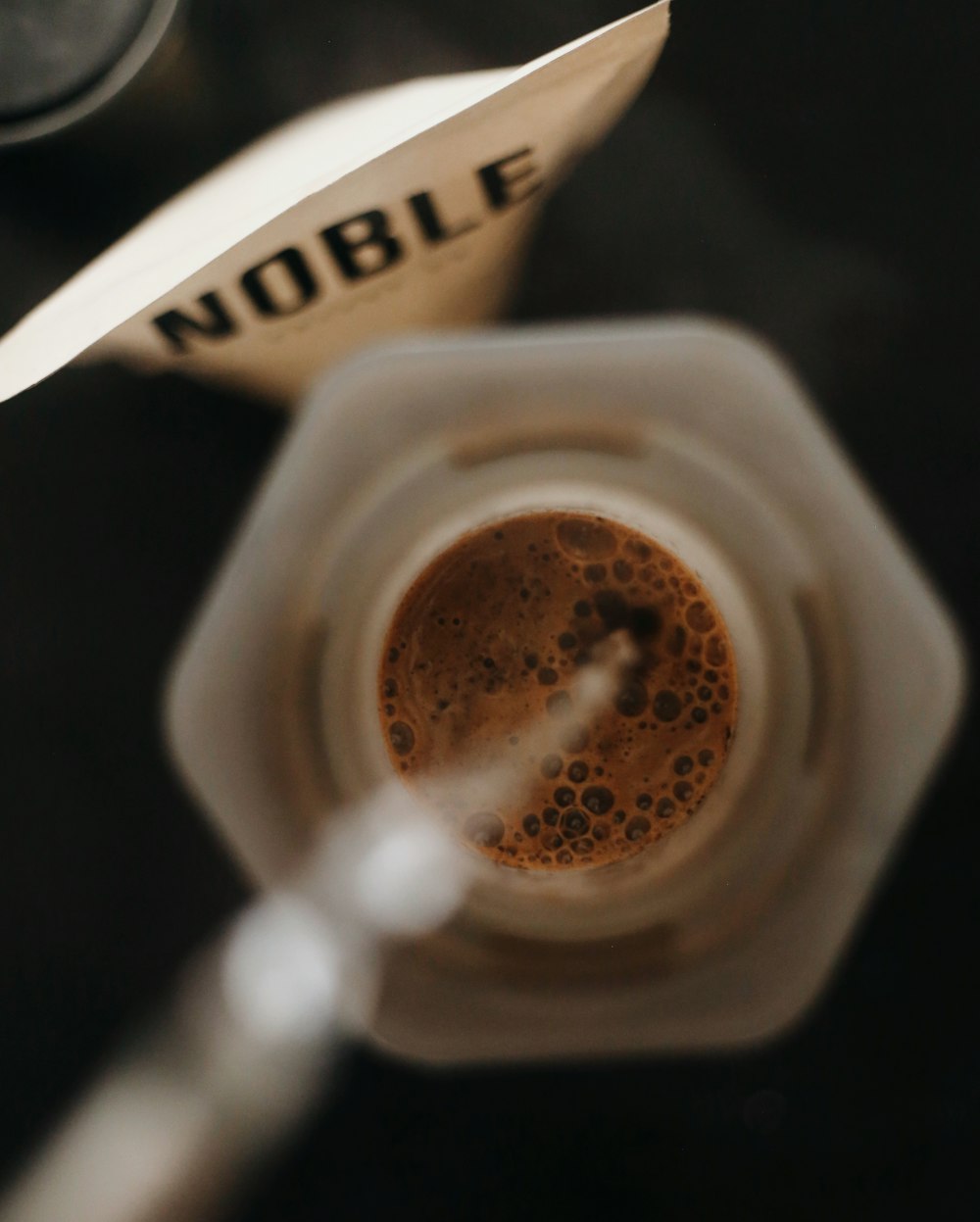 brown liquid in white ceramic mug