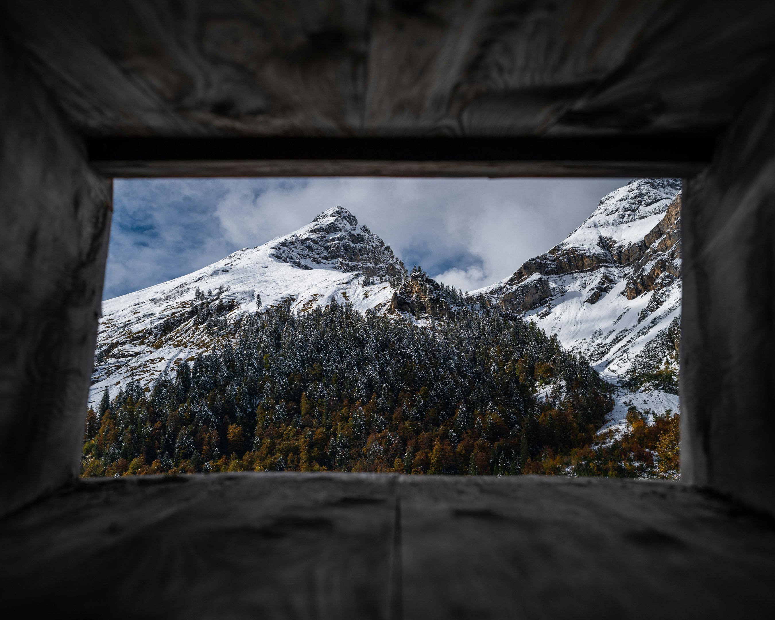 snow covered mountain during daytime