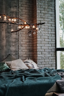 black and white textile near brown brick wall