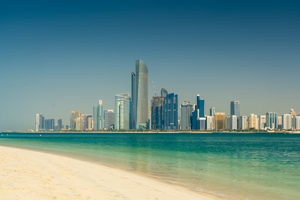 city skyline across the sea during daytime