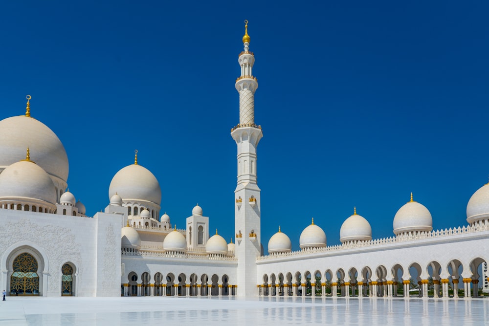 white concrete building under blue sky during daytime