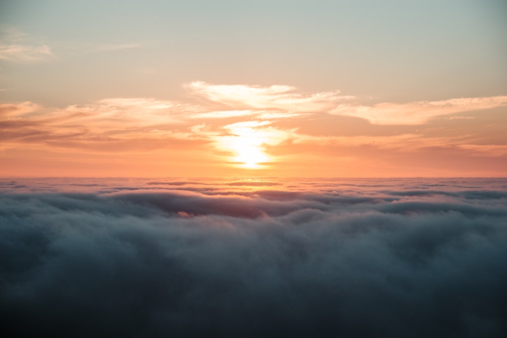 clouds and sun during sunset