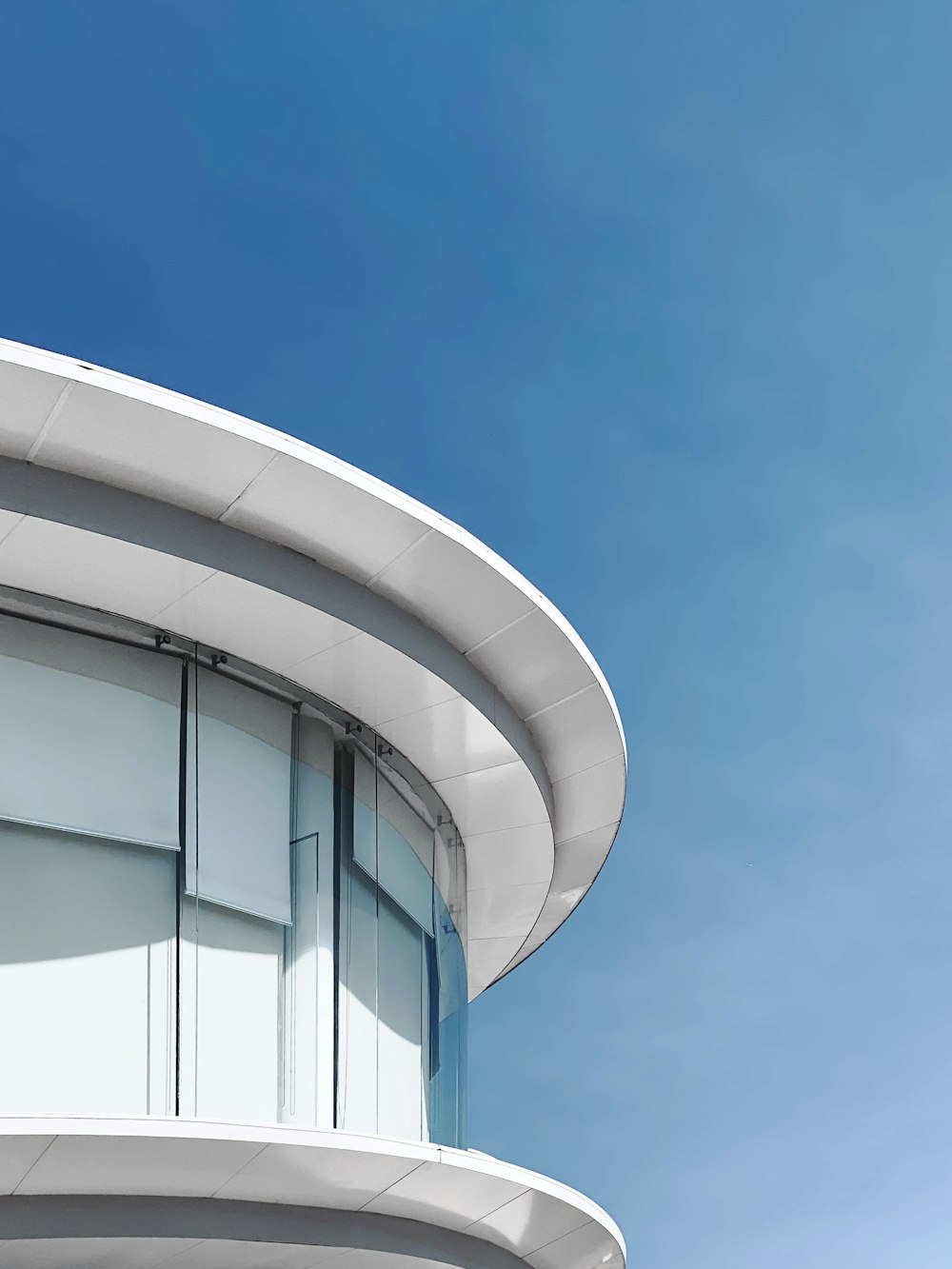 white concrete building under blue sky during daytime