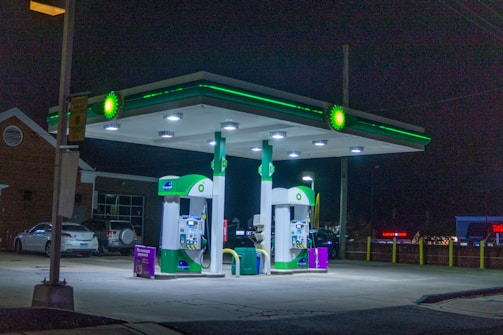 white and green gas station