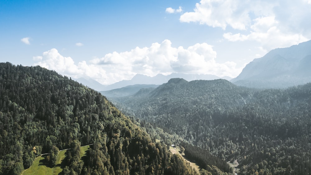 green and brown mountains under blue sky during daytime