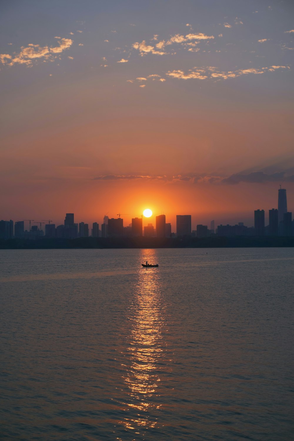 silhouette of city skyline during sunset