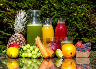 fruits and vegetable in clear glass jar