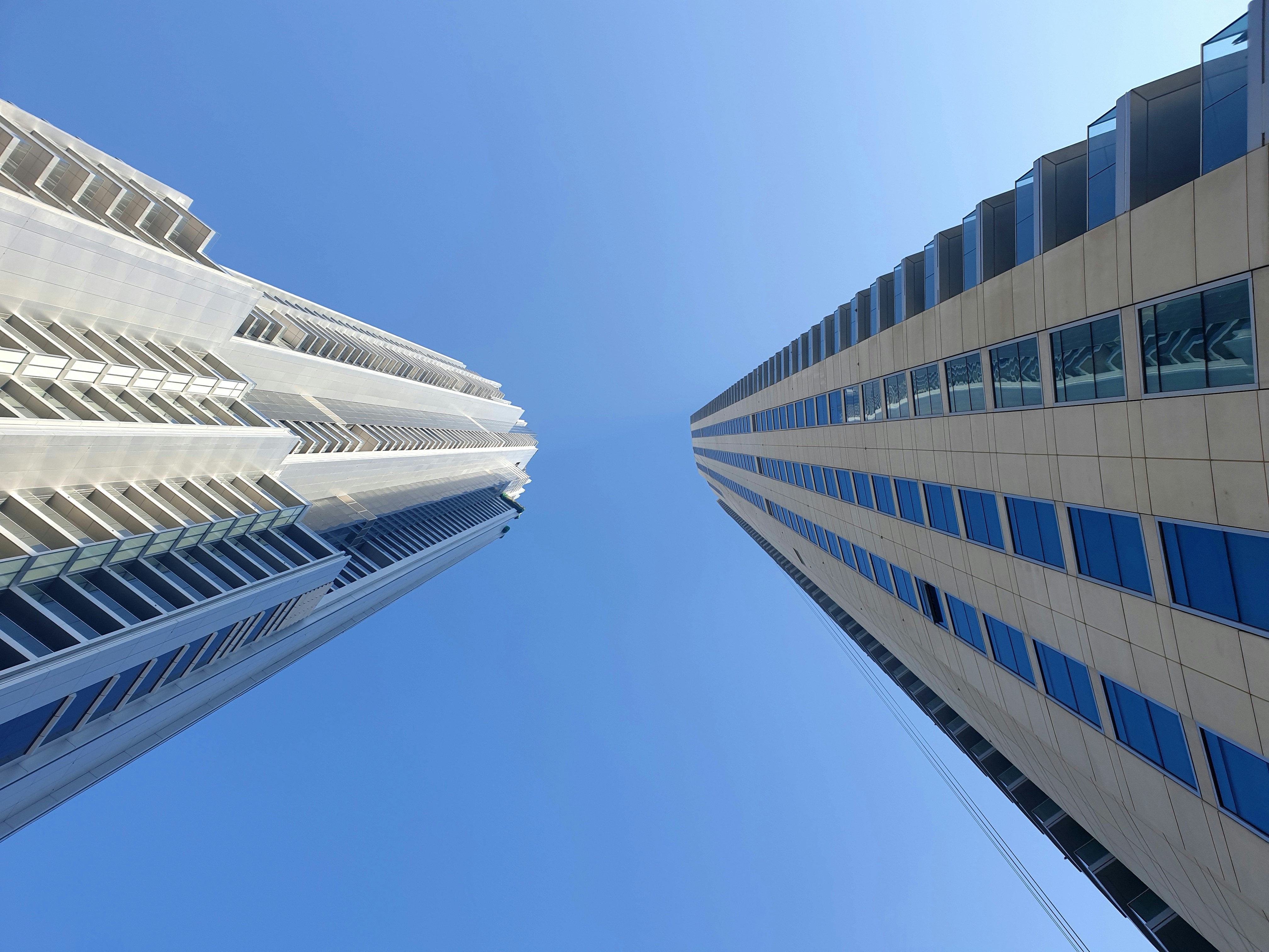 white and blue concrete building during daytime